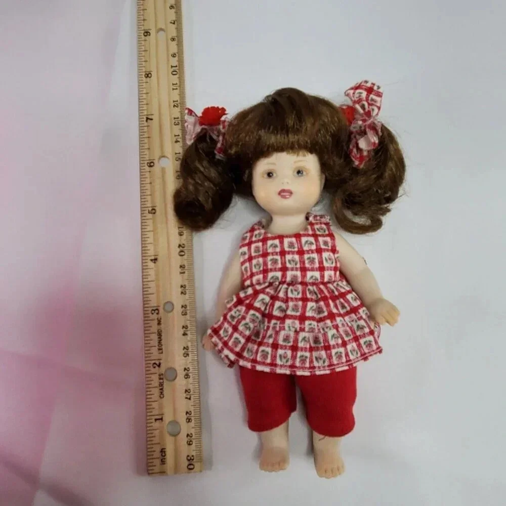 Vintage DELTON Porcelain Doll  Dressed In Red  7 Inch Tall Movable Arms & Legs